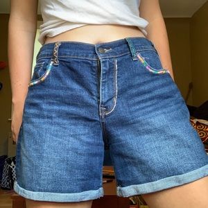 Hand embroidered high rise jean shorts in size 12